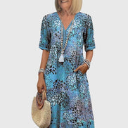 Bella Floral V-Neck Midi Dress with Pockets in Polyester